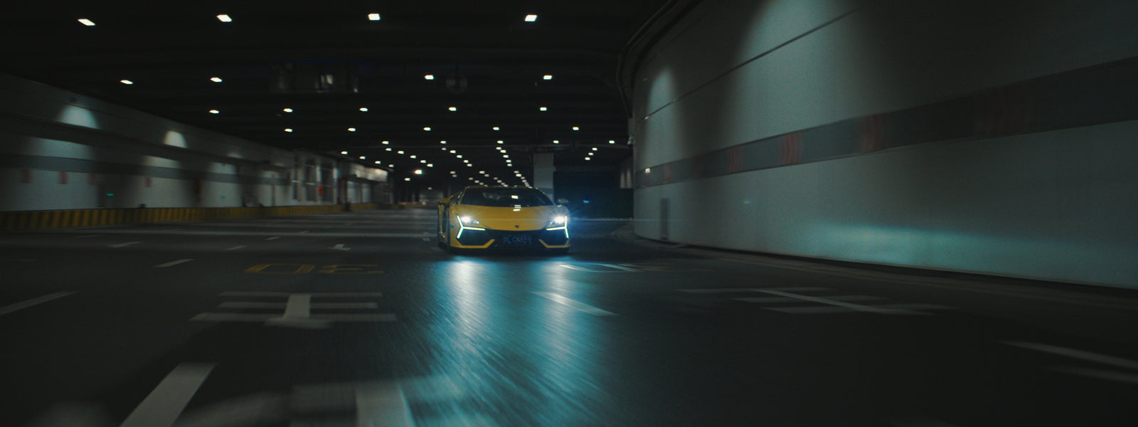 Official DZOFilm Arcana sample scene showing anamorphic flare in a tunnel